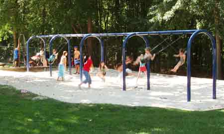 SWINGS AT INTERMEDIATE PLAYGROUND